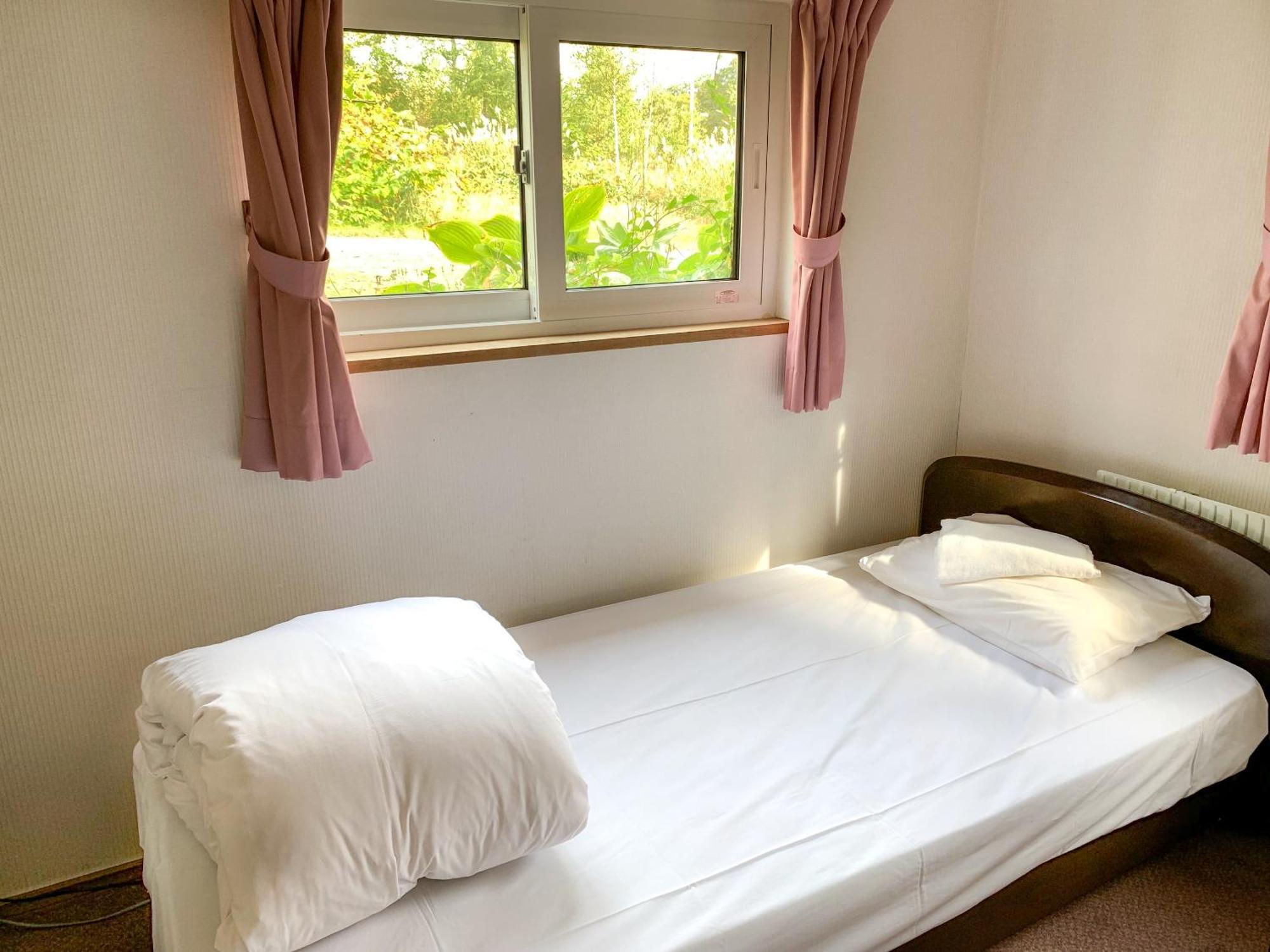 Niseko Ski Lodge - Higashiyama Phòng bức ảnh